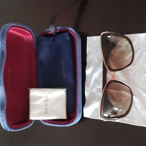 Escada sunglasses in Gucci case